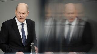 FILE - Germany's Chancellor Olaf Scholz makes a government statement in the Bundestag, Berlin, Wednesday, Dec. 13, 2023. German Chancellor Olaf Scholz is calling for calm and a readiness to accept compromises as the country faces protests by farmers angry
