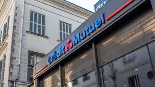 A view of Credit Mutuel Bank front store facade view with logo and signage