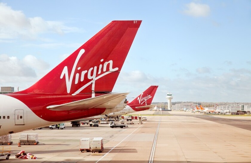 Virgin Atlantic plane planes on the ground, South terminal Gatwick airport London UK