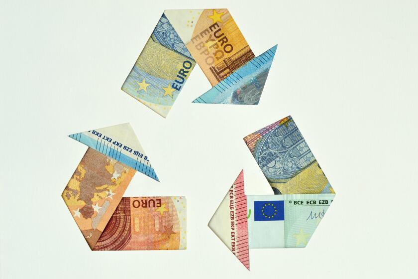 Recycle symbol made with euro banknotes - Ecology and recycling concept