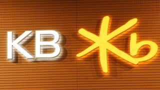 The logo of KB Financial Group is pictured during the company's annual shareholder meeting at its headquarters in Seoul March 27, 2009.  KB Financial is the holding firm of South Korea's top retail bank, Kookmin Bank.  REUTERS/Jo Yong-Hak (SOUTH KOREA BUS