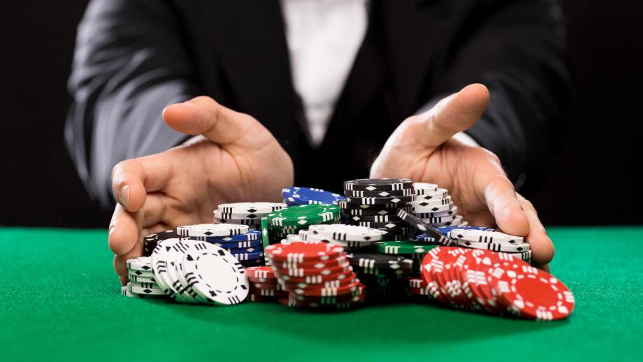 poker player with chips at casino table