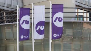 Flags with the Nova Ljubljanska banka logo, NLB logo, Slovenian bank