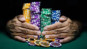 Montreal,Canada,14 October, 2018.Hands holding stacks of casino gambling chips.Credit:Mario Beauregard/Alamy Live News