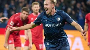 Bochum's Lukas Daschner celebrates scoring during the Bundesliga soccer match between VfL Bochum and 1. FC Koln at Vonovia Ruhrstadion, Bochum, Germany, Saturday Nov. 11, 2023. (Bernd Thissen/dpa via AP)