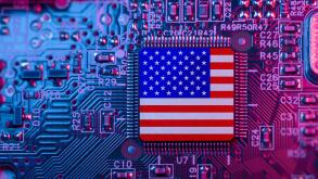 US flag on Computer Chips for Chip War Concept. USA Global chipmakers. Microchip on Motherboard with America world largest chip manufacturer and suppl