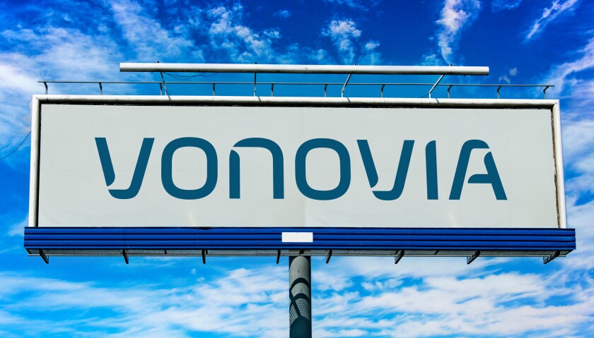 Advertisement billboard displaying logo of Vonovia