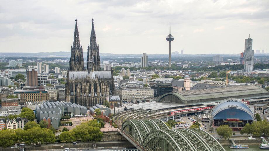 View from the Cologne Triangle observation tower of Cologne Cathedral, the Philharmonic Hall, and the Rhine with the Hohenzollern Bridge, Germany, Nor
