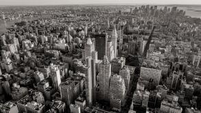 Black and white aerial view of New York City skyscrapers with Midtown, Chelsea, East Village and Lower Manhattan. NYC