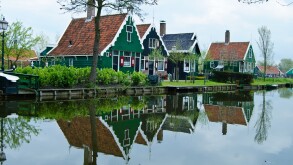 Charming traditional Dutch houses along a canal in Zaanse Schans