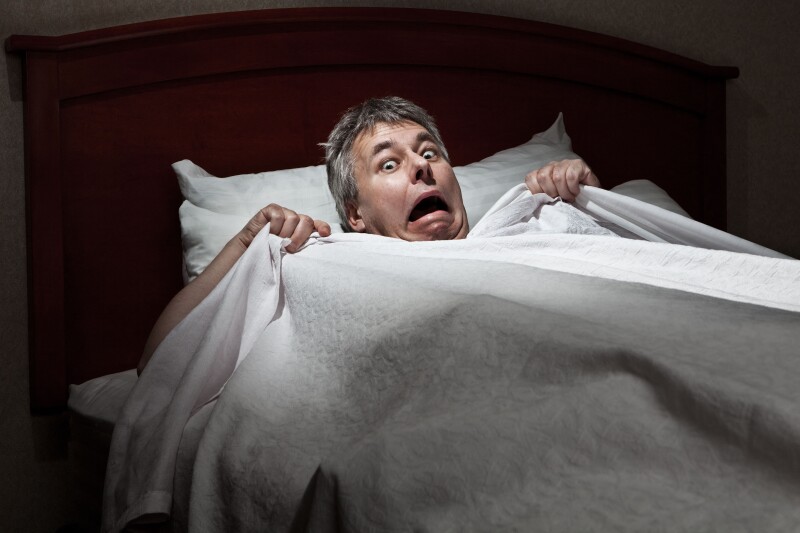 Man startled awake by intruder