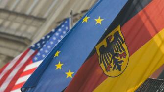 A view of German, EU and US flags in Krakow's center. On January 14, 2020, in Krakow, Poland. (Photo by Artur Widak/NurPhoto)