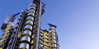 A photograph of the Lloyds Building in London from ground up