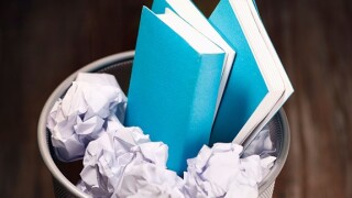 Book in a bin from Alamy 17Jul25 575x375.jpg