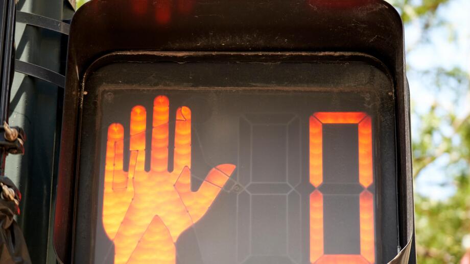 red hand stop sign with zero countdown timer pedestrian crossing crosswalk people signs chicago illinois united states of america