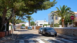 A residential street in summertime Cala Blanca Minorca Balearic Islands Spain Europe