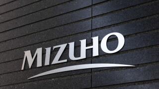 Logo of Mizuho Bank on their headquarter building in Otemachi, Tokyo on November 25, 2022.
