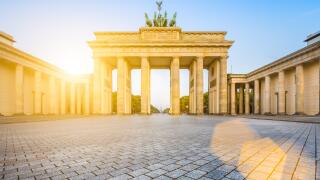 Famous Brandenburger Tor (Brandenburg Gate), one of the best-known landmarks and national symbols of Germany, at sunrise, Berlin, Germany