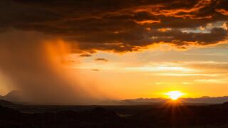 Rain approaching in the desert at sunset, Namibia