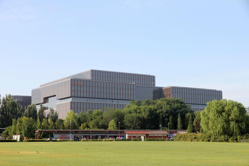 A view of the headquarters building of the Asian Infrastructure Investment Bank (AIIB) in Beijing, China Saturday, Sept. 05, 2020. (FeatureChina via AP Images)