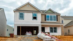 Horizontal shot of New Home Construction.  All visible markings and signs have been removed.
