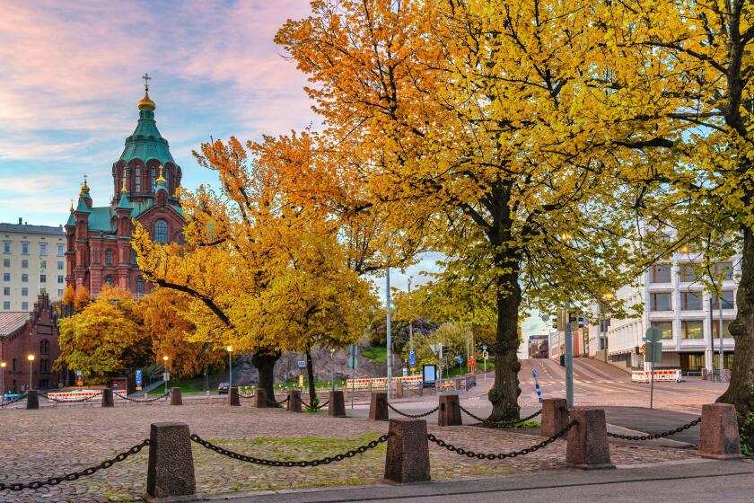 Helsinki Finland, city skyline at Uspenski Cathedral with autumn foliage season