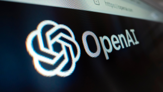 Close-up view of OpenAI logo on its website, shot with macro probe lens