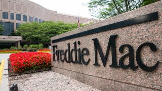 A logo sign outside of the headquarters of the Federal Home Loan Mortgage Corporation (FHLMC), known as Freddie Mac, in Tysons C