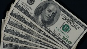 six $100 dollar bills