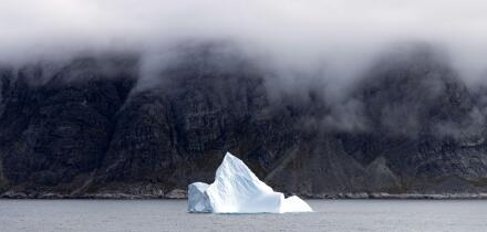 Greenland iceberg - one iceberg in a Greenland fjord, southern Greenland landscape, Arctic, Europe.
