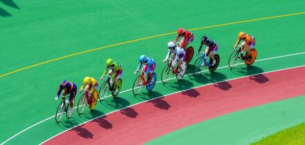 Female competitors in a "keirin" cycle race at Kyoto Keirin Racetrack in Mukomachi, Kyoto, Japan.