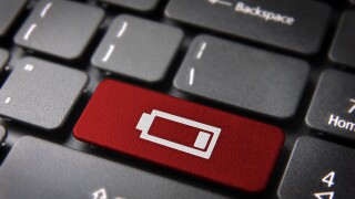 Technology key with low battery icon on laptop keyboard. Included clipping path, so you can easily edit it.