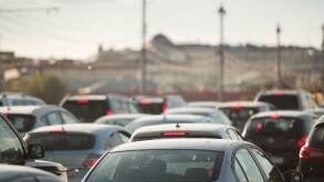 cars in traffic jam in a city during rush hour