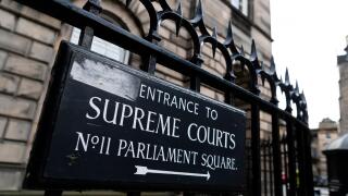 Sign at entrance to Parliament Square and the Supreme Courts ( Court of Session) in Edinburgh Old Town, Scotland, UK