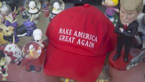 Caricature of Donald Trump with hisiconic red hat at a souvenir shope in New York City.