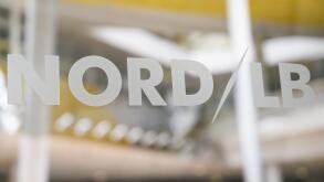 04 April 2019, Lower Saxony, Hannover: On a glass door is the logo of Norddeutsche Landesbank NordLB. Photo: Christophe Gateau/dpa