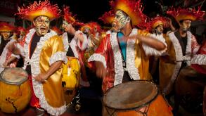 Traditional Murgas and samba schools during the Llamadas procession that starts the carnival in Montevideo, Uruguay