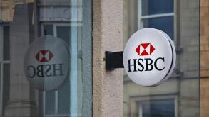 HUDDERSFIELD, UK - JULY 10, 2016: HSBC bank branch in Huddersfield, UK. HSBC is one of largest bank groups, holding assets of USD 2.69 trillion worldw