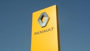 Renault car logo sign - yellow with blue sky background