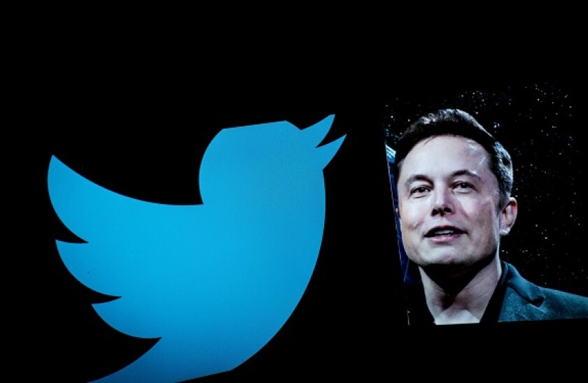 Rome, Italy, Italy. 26th Apr, 2022. In this photo illustration, Elon Musk is seen displayed on a smartphone with a background of the Twitter logo. after Elon Musk's $44 billion acquisition of social media platform Twitter. (Credit Image: © Andrea Ronchini