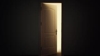 Open door with light in dark room