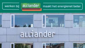 Arnhem, The Netherlands - October 1, 2025: Office of Alliander Energy with the Dutch text for "Working at alliander makes the energy network better"