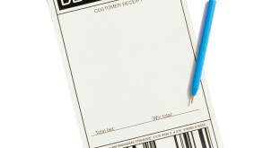 A betting slip and pen