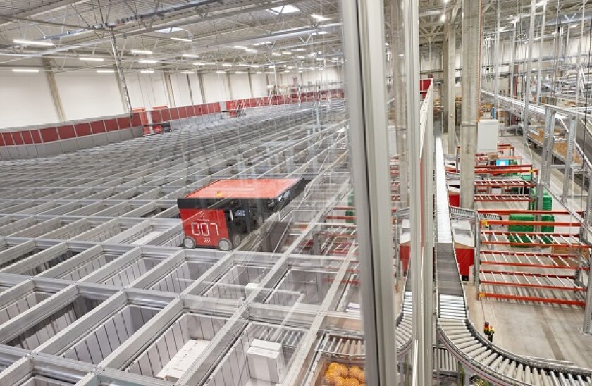 Bad Oldesloe, Germany. 21st Oct, 2022. View of a robot with the number 007 of the Autostore automated box storage system in the Asklepios logistics center. Asklepios opened new logistics center for the supply of clinics and healthcare facilities. Credit: 