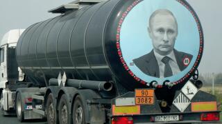 A large tank truck (Serbian licence plate) with image of Vladimir Putin on its rear, drives along the high way through Croatia.