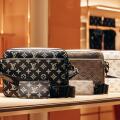 Bologna, Italy - October 6, 2024: Louis Vuitton bags in a boutique window
