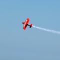 The Oracle stunt biplane climbs into the skies at the 2010 Chicago Air and Water Show.