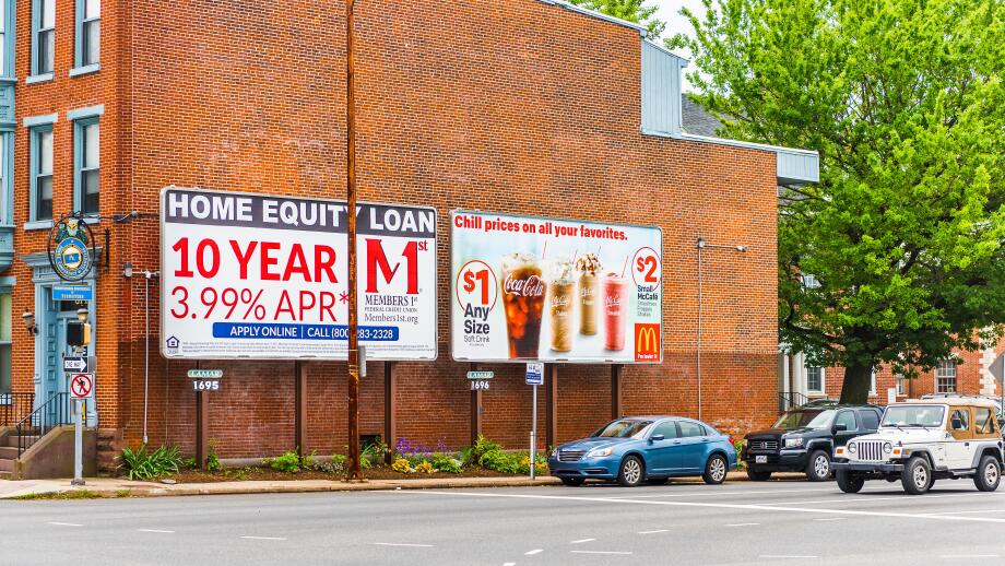 Harrisburg, USA - May 24, 2017: Pennsylvania capital city brick houses with advertisement in downtown for Home Equity loans