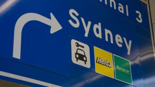 Direction sign at Sydney Airport Australia