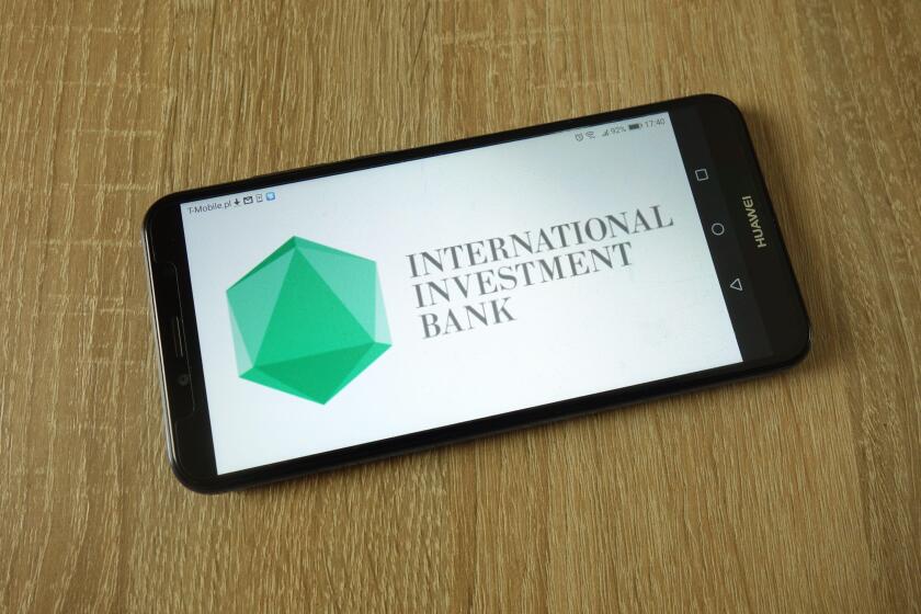 International Investment Bank logo displayed on smartphone